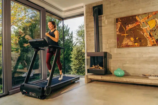 Female running on Echelon Stride Treadmill