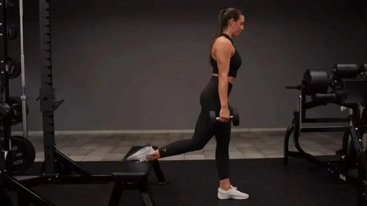 Female performing bulgarian split squat