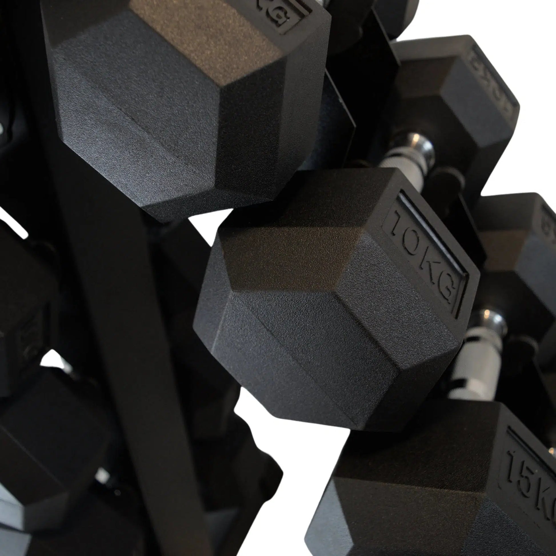 close up uf dumbbells on Tree rack